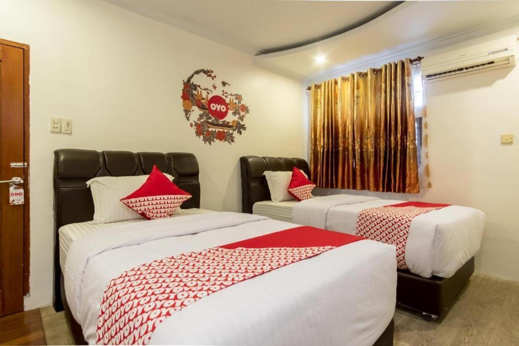 OYO 619 Naufal Guest House Syariah Medan Exterior foto